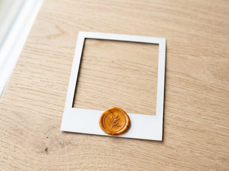 Polaroid frame with an amber wax seal, a reviewed operations example marker.